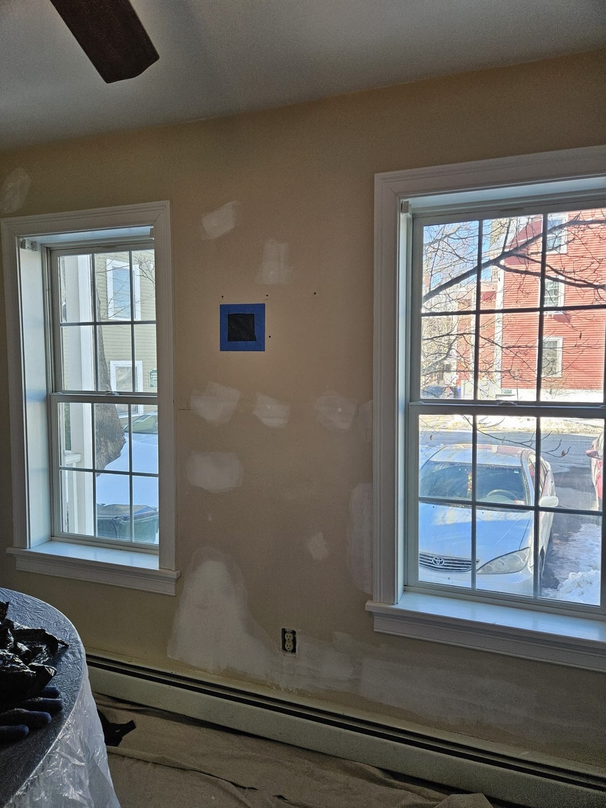 Drywall repair and patching before paint