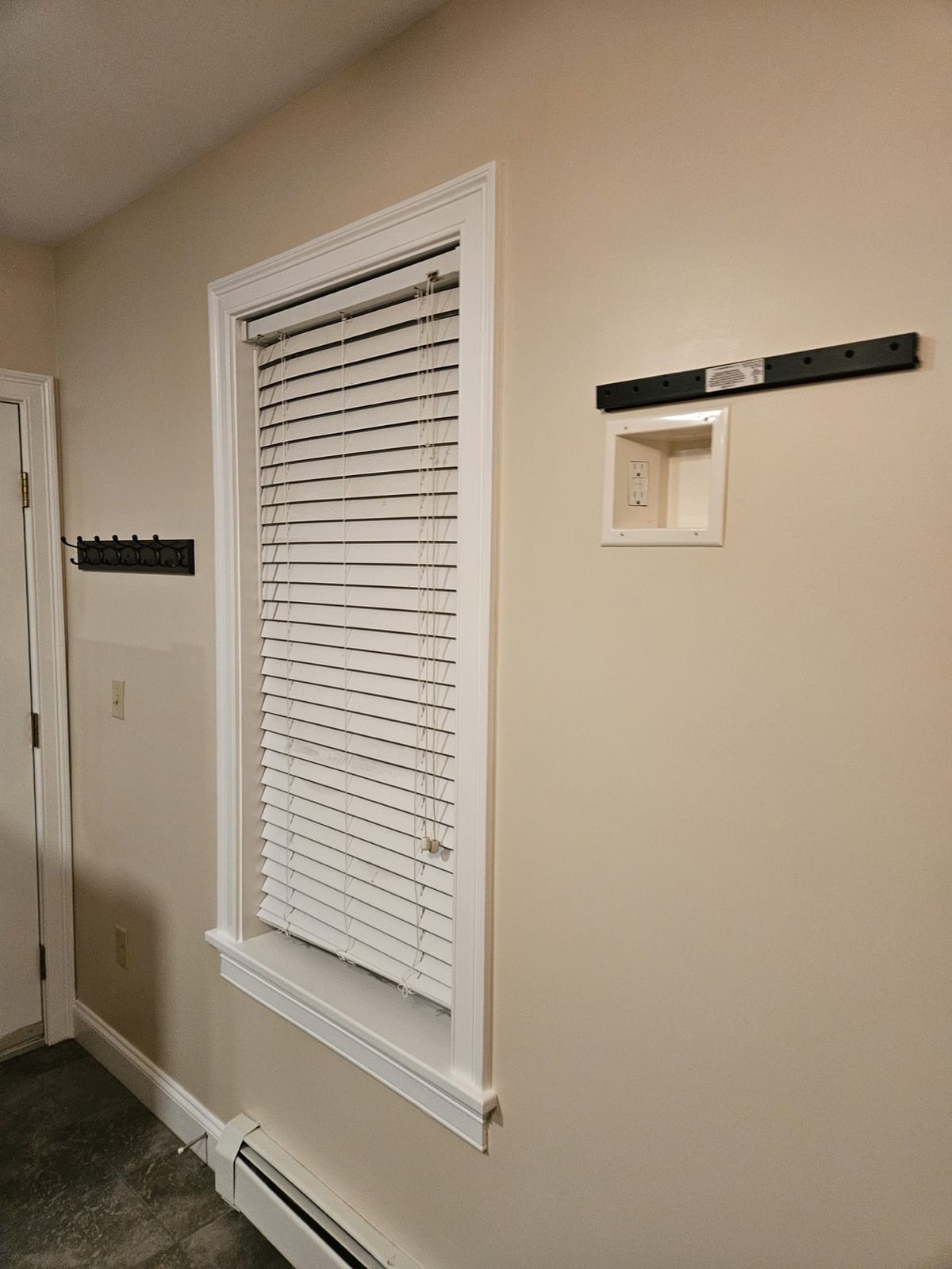TV mount installation with hidden wiring