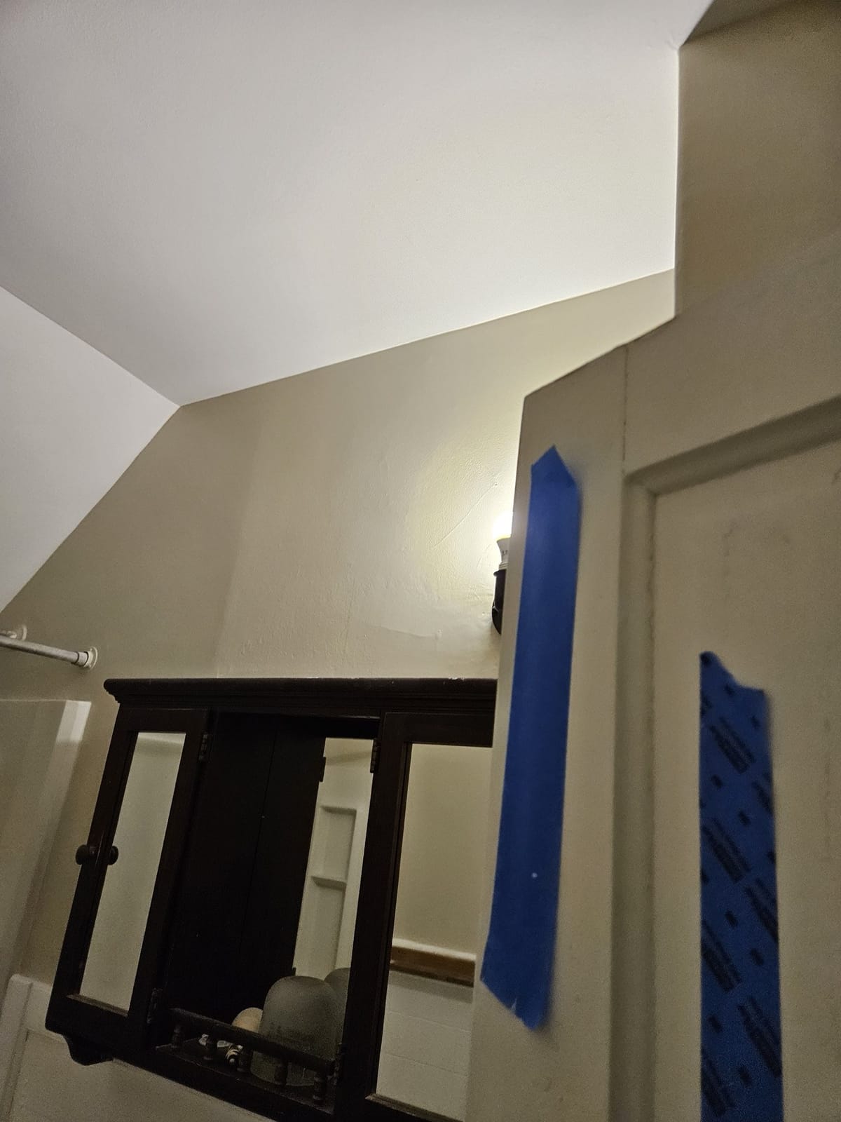 Repaired and repainted water damaged ceiling in a New Hampshire home